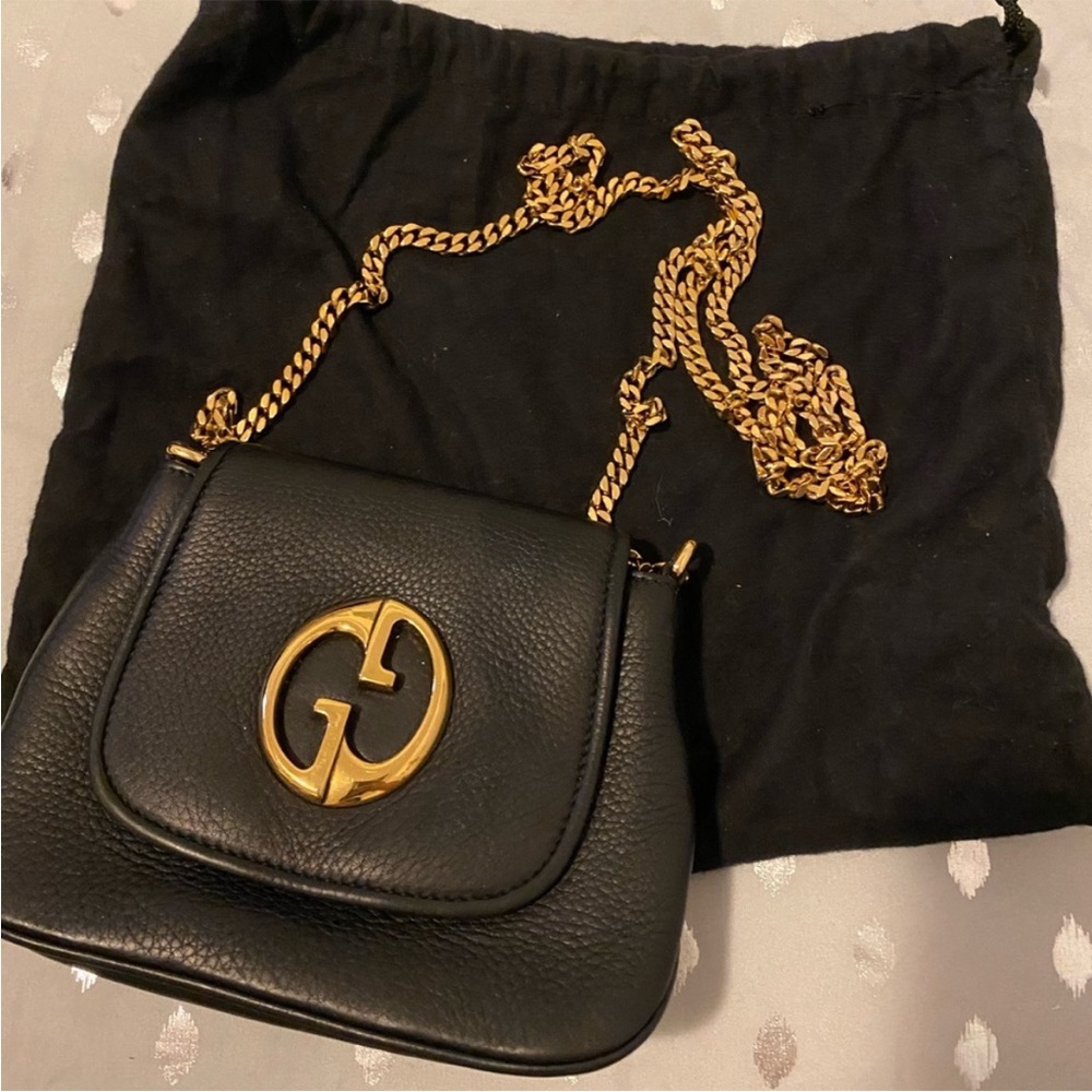 Gucci black pebbled leather ‘1973’ crossbody chain bag